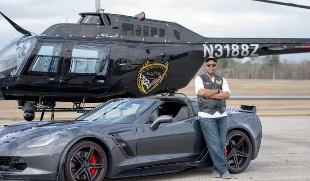 C7 Corvette near black helicopter