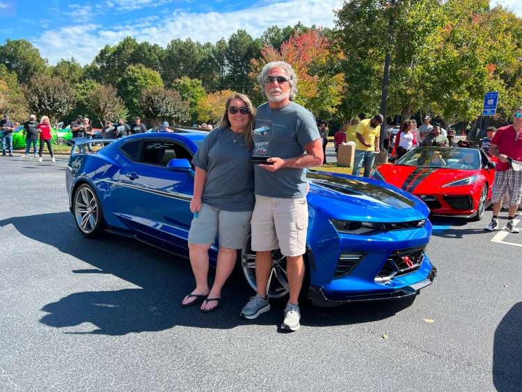 Trophy winning blue Camaro