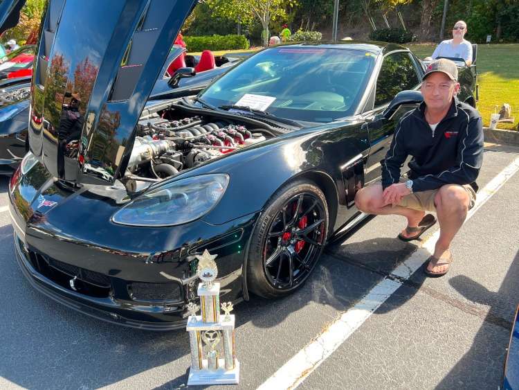 Black 2013 C6 Corvette coupe with upgraded engine.