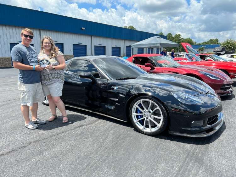 Black supercharged ZR1 black Corvette coupe.