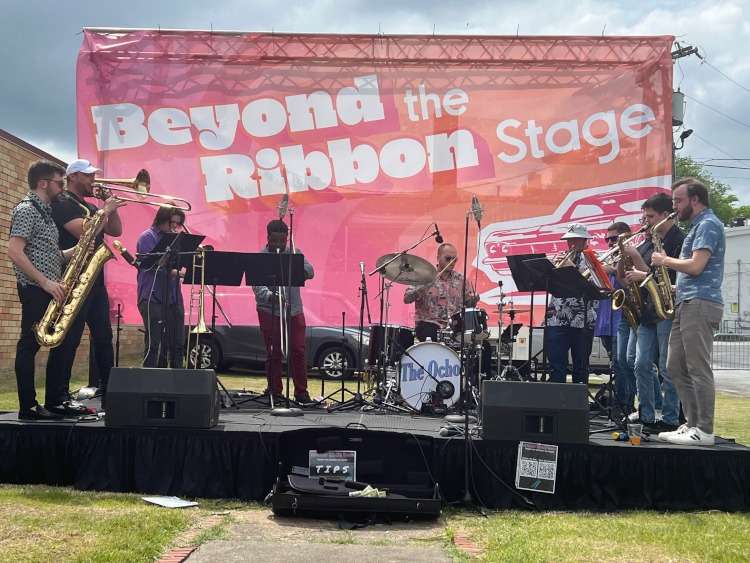 A band playing on a stage.