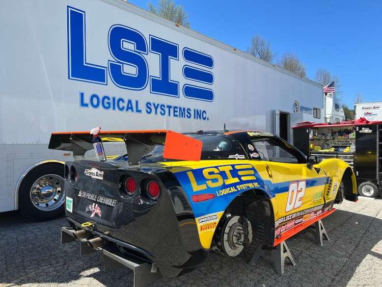 A C6 race car on jacks