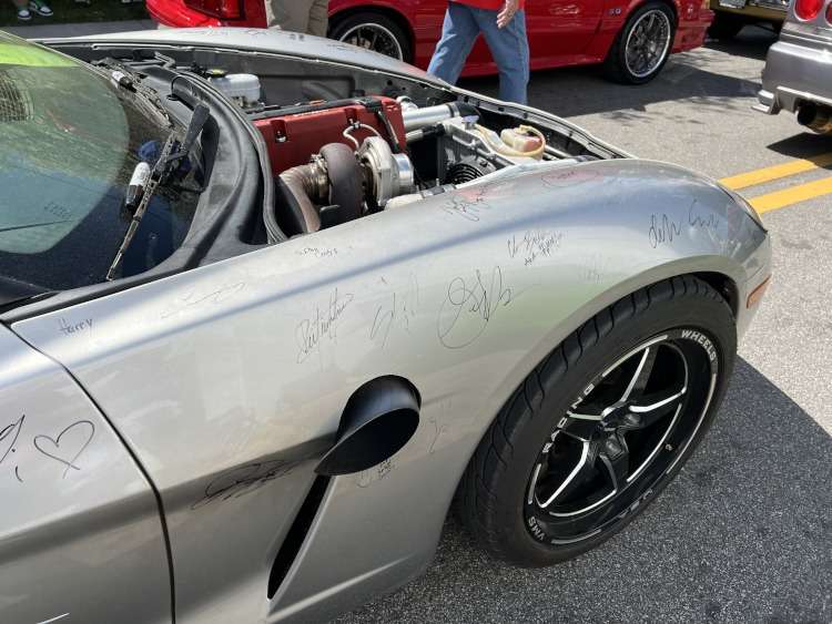 Exhaust pipes coming out the side of a C6 Corvette.