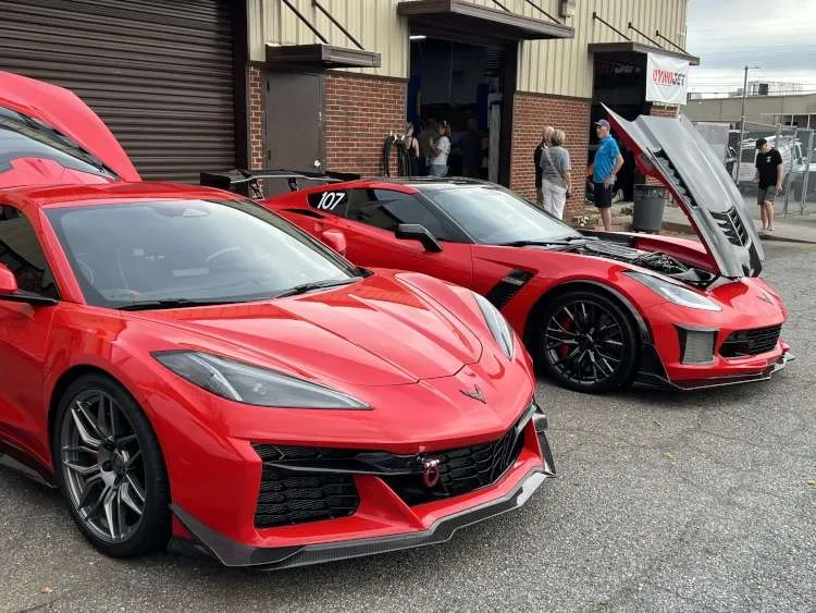Two red Corvettes, C8 Corvette Z06, C7 Corvette Z06, parked, car show, Vettes of Atlanta Magazine, sports cars, performance vehicles, Cartersville GA, Marshall's Dyno Day.