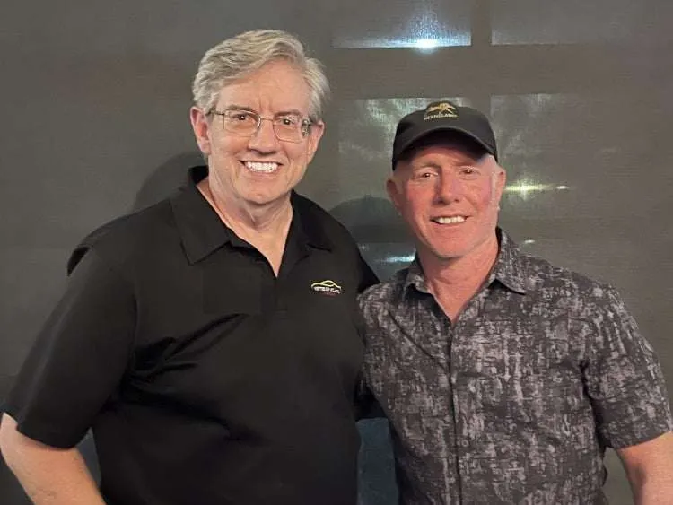 Vettes of Atlanta Magazine's editor, Rod Worley with Corvette Racing legend Johnny O'Connell at a car enthusiast event.