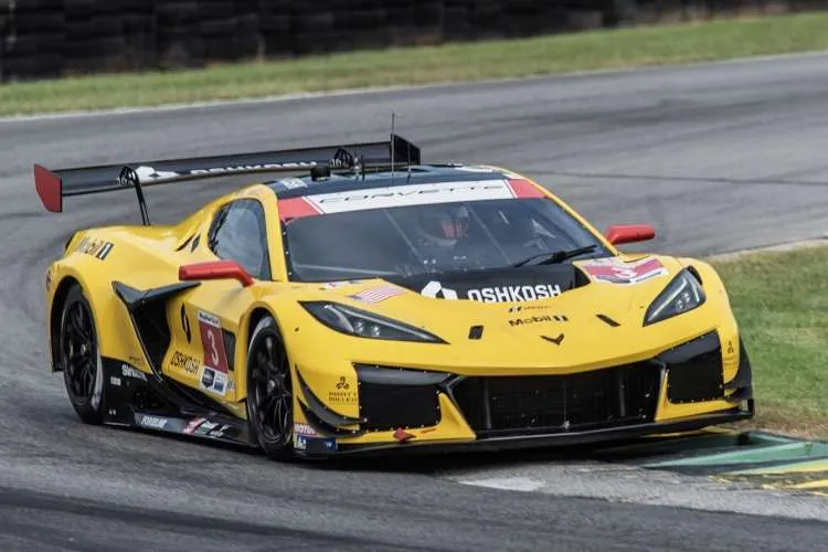 The winning #3 Corvette Z06 GT3.R race car, driven by Antonio Garcia and Alexander Sims, deep in a corner at the VIR race.