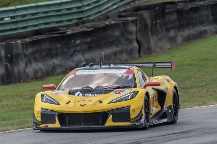 Front-quarter view of the #4 Corvette Z06 GT3.R on track at the 2025 IMSA race at VIR.