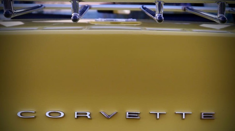 Yellow third-generation Corvette back logo lettering with luggage rack