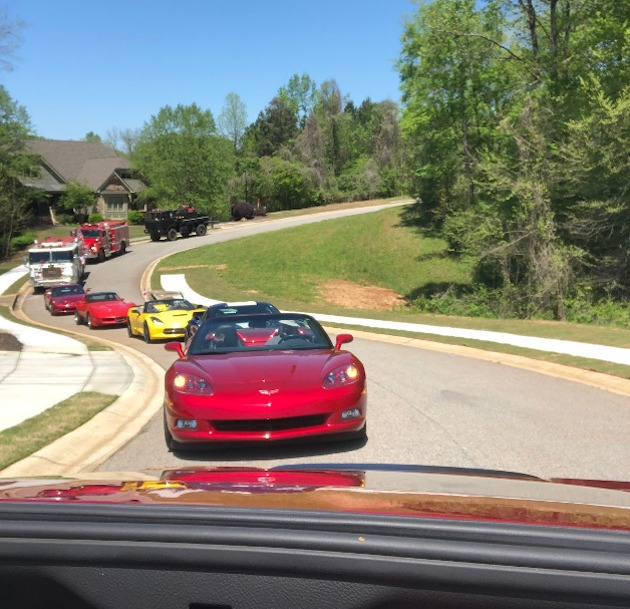 Several Corvettes and fire trucks during the First Responders parade on April 16th 2020