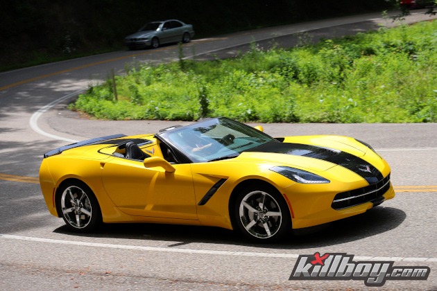 C7 yellow Corvette convertible with black racing stripe