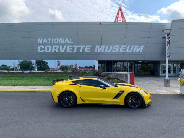 C7 yellow Corvette parked at the National Corvette Museum
