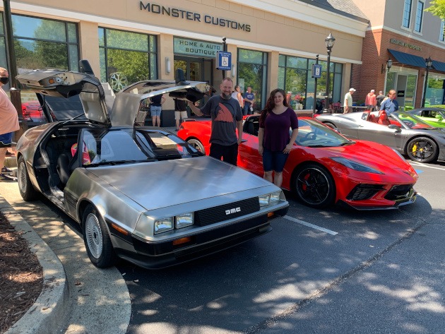A DelOrean and an eighth-generation Corvette coupe