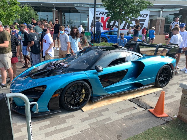 Blue McLaren hypercar at car show