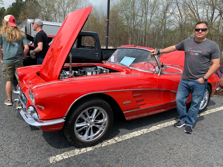 First-generation Red Corvette roadster with mag wheels