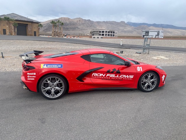 A Torch Red eighth-generation Corvette at the Ron Fellows Performance Driving School