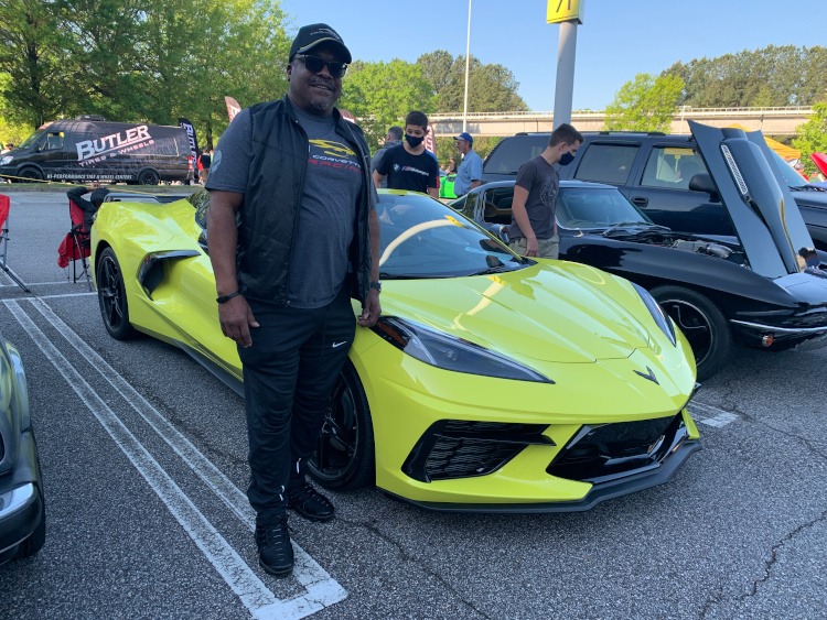 Eighth-Generation 2020 yellow Corvette convertible with owner