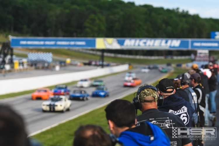 HSR fans along the fence watching the race at Road Atlanta