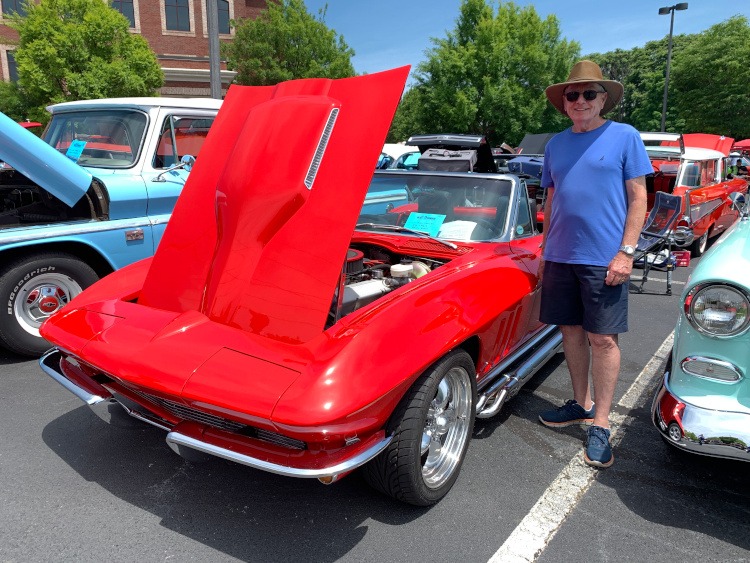 Second-generation Rally Red Corvette roadster with side pipes