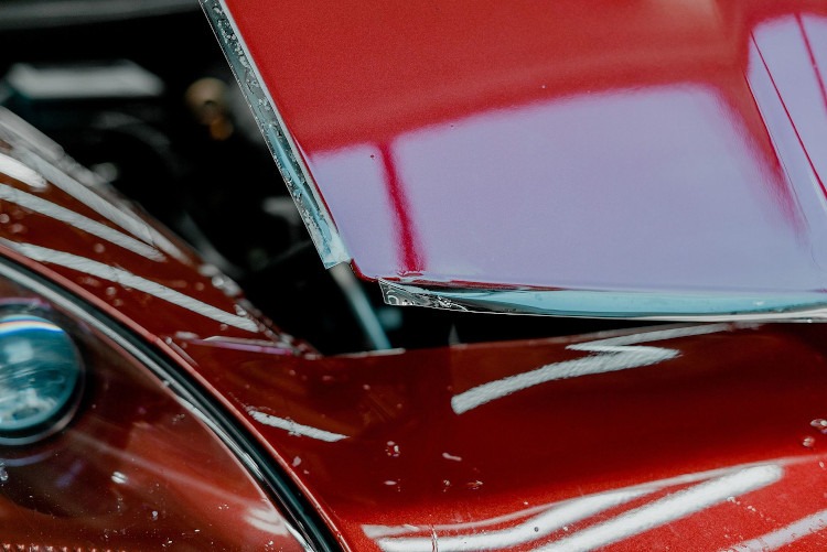 Close up view of XPEL Ultimate Plus on the hood of a Corvette