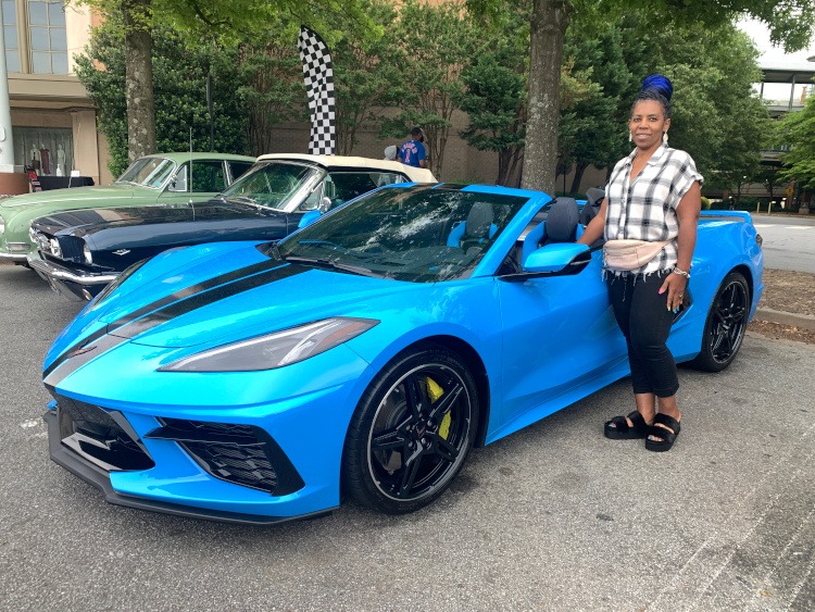 Eighth-generation Corvette in Rapid Blue with racing stripe