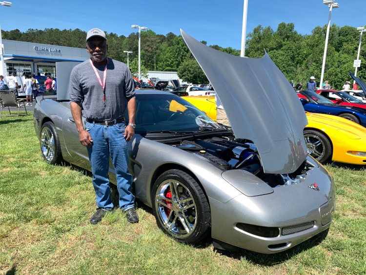 Fifth-generation Light Pewter Metallic Corvette at car show