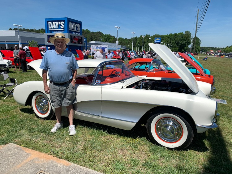 First-generation Polo White with Red Interior Corvette at car show