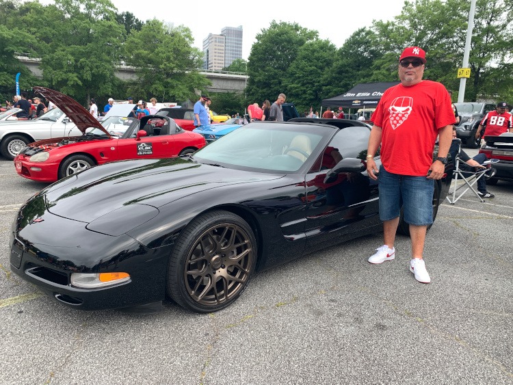 Fifth-generation Black Corvette coupe with custom wheels