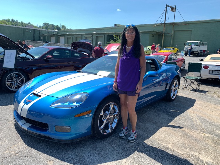 Sixth-generation blue with white stripe Corvette coupe
