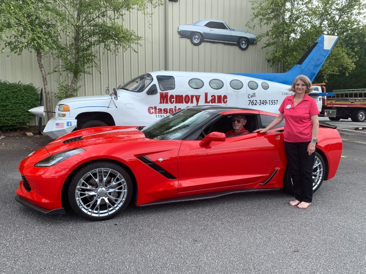 Seventh-generation Corvette coupe in Torch Red color