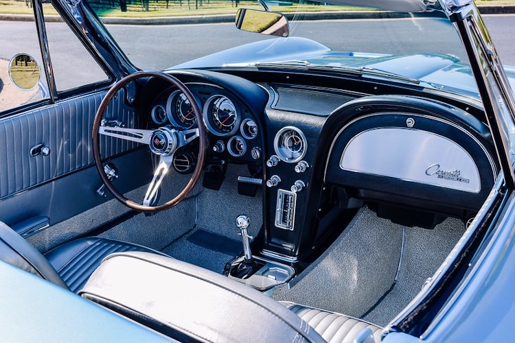 Interior of a second-generation silver blue Corvette convertible