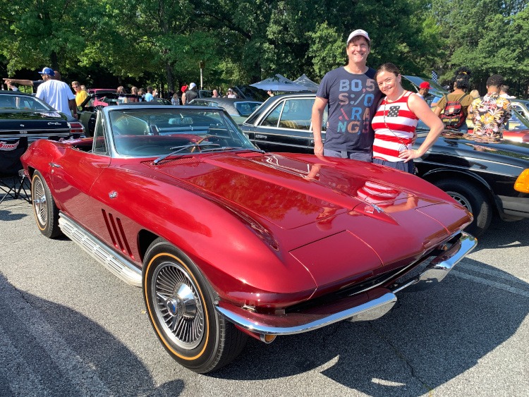 Second-generation Corvette convertible in dark red with sidep pipes