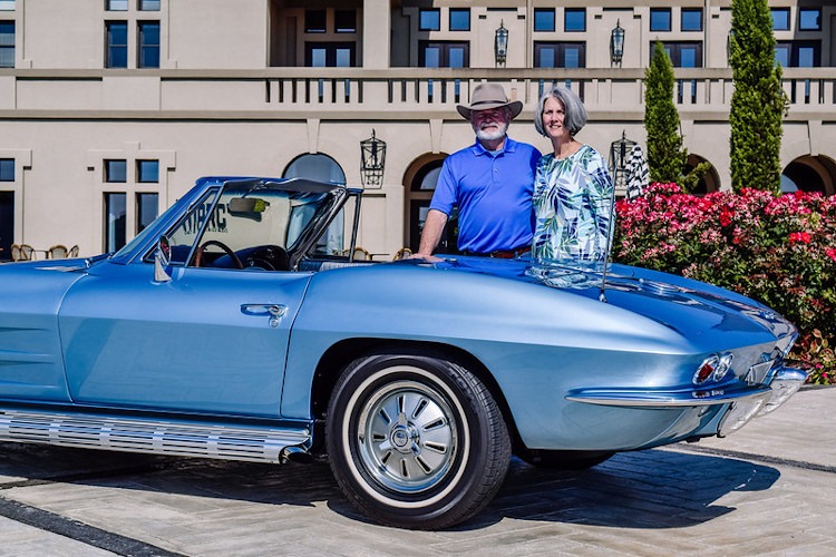 A 1964 silver blue corvette roadster