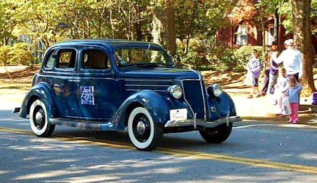 1936 blue Ford car with whitewall tires