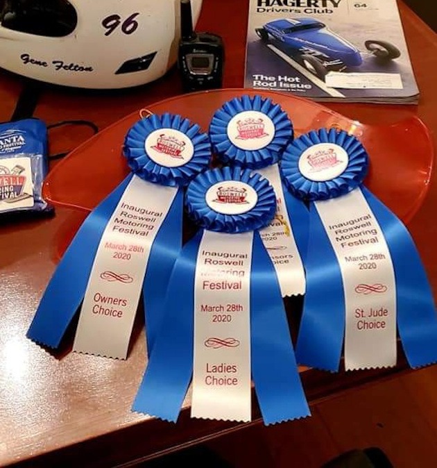 Blue and white ribbons for the Inaugural Roswell Motoring Festival