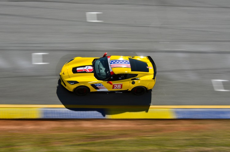 Seventh-generation Corvette in yellow on a race track