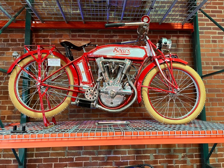 A vintage Sears motorcycle in red