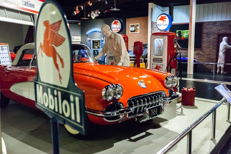 Red vintage Corvette inside the National Corvette Museum
