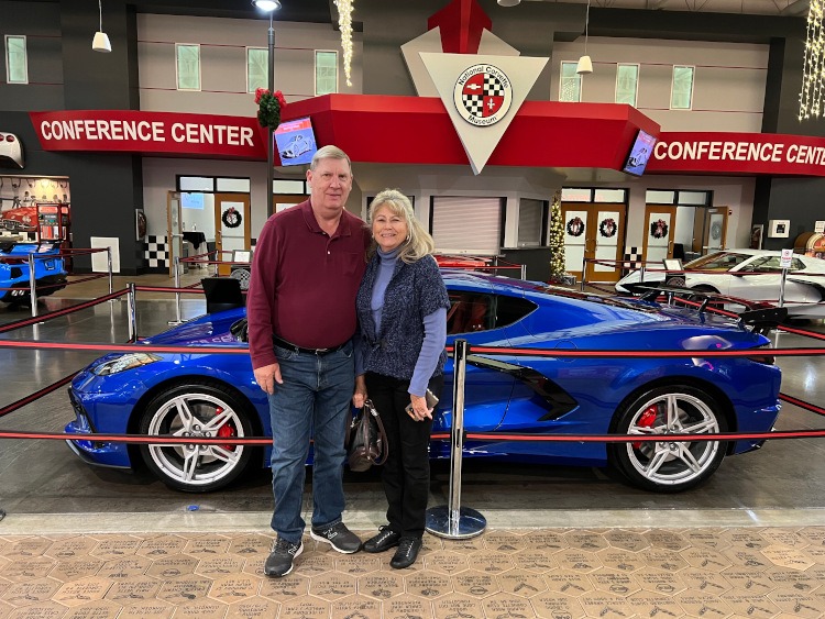 A couple pick up their C8 Corvette at the NCM