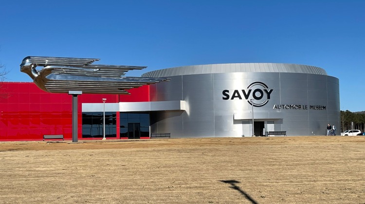 Bright red and silver exterior of the Savoy Museum