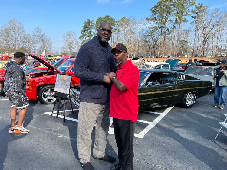 Shaq and Corvette club member at car show