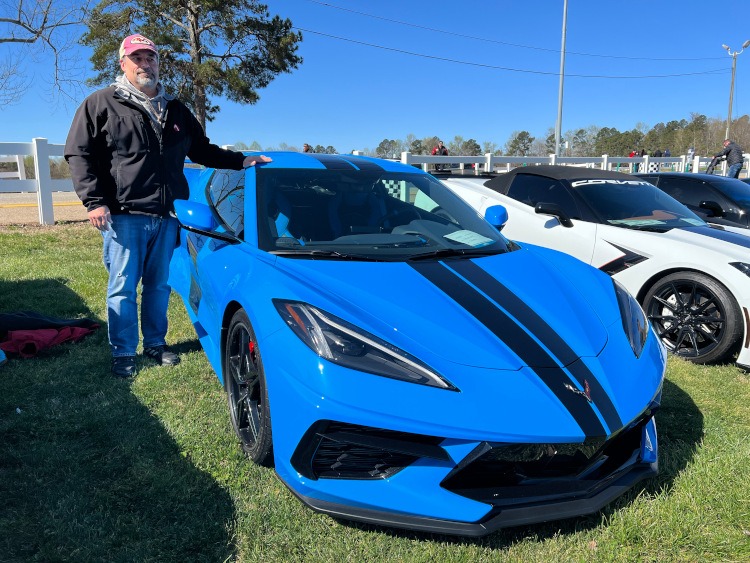 Eighth-generation blue Corvette coupe with racing stripe