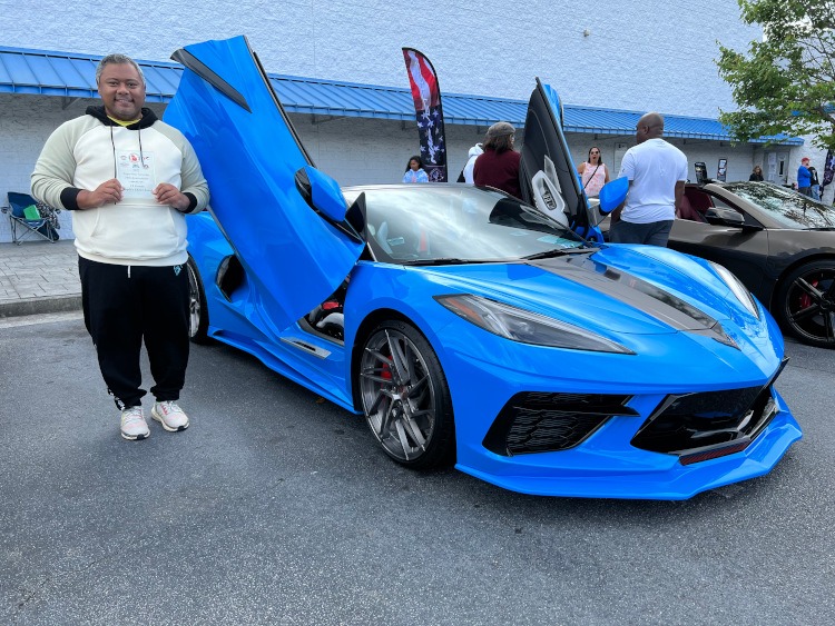 C8 Rapid Blue Corvette convertible at car show