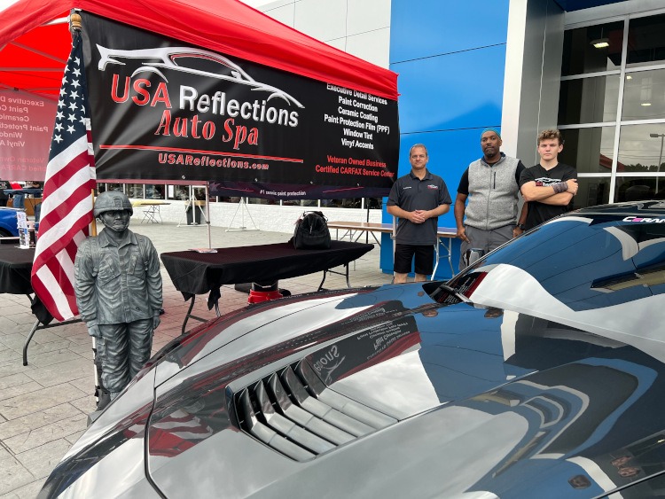 USA Auto Reflections Auto Spa tent at a car show