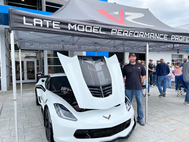 Vengeance Racing tent with a C7 Corvette coupe