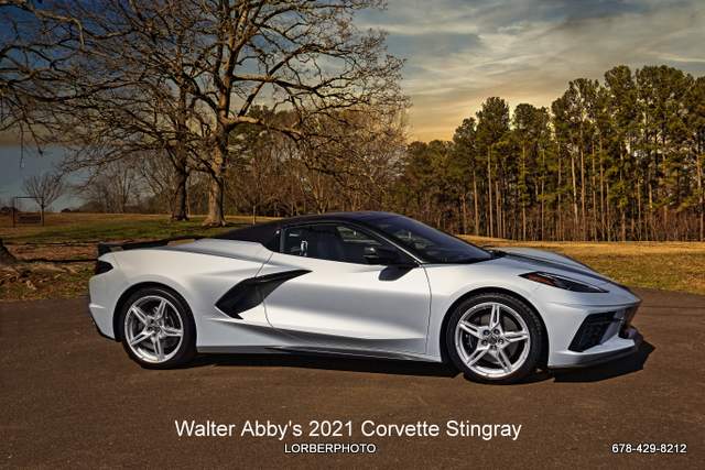 Eighth-generation Silver Flair Corvette with spoiler
