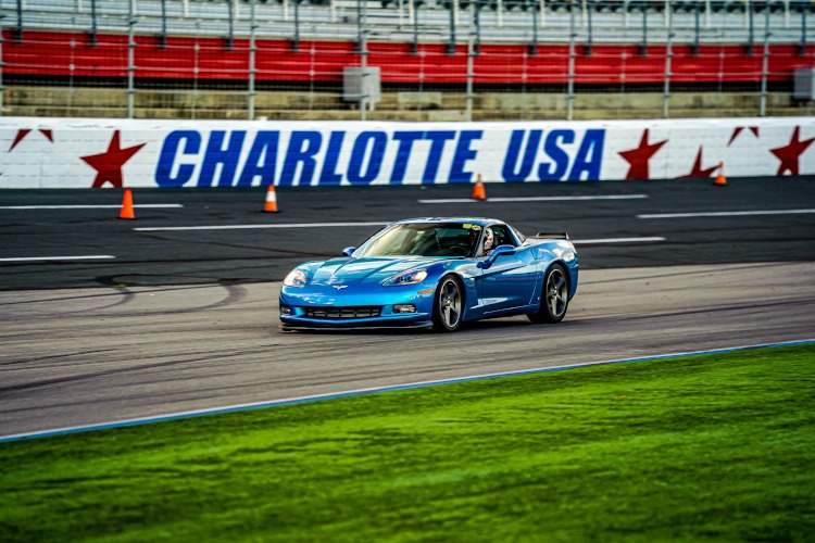 Blue sixth-generation Corvette coupe at Charlotte speedway