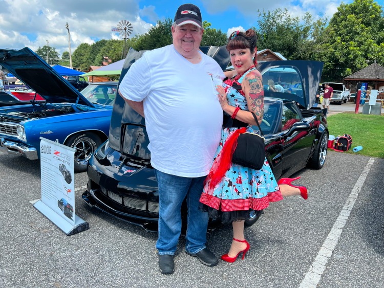 Chief with pinup model 2008 Z06 Black Corvette coupe