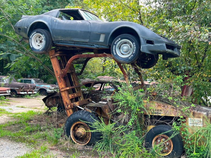 Third-generation Corvette up on a forklift