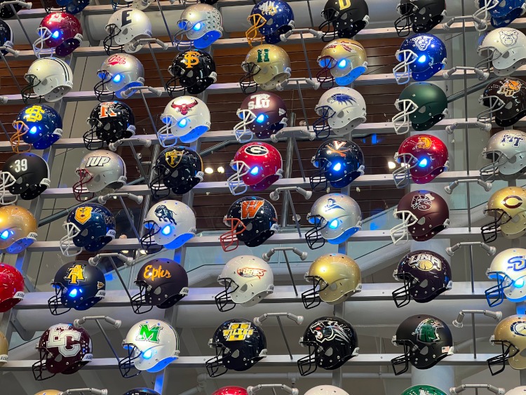 Display of authentic college football helmets