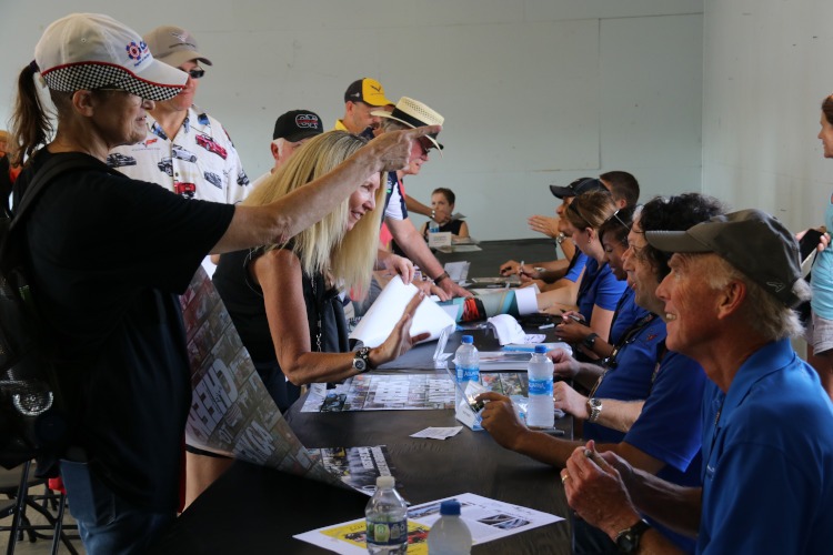 GM Corvette celebrities signing autographs